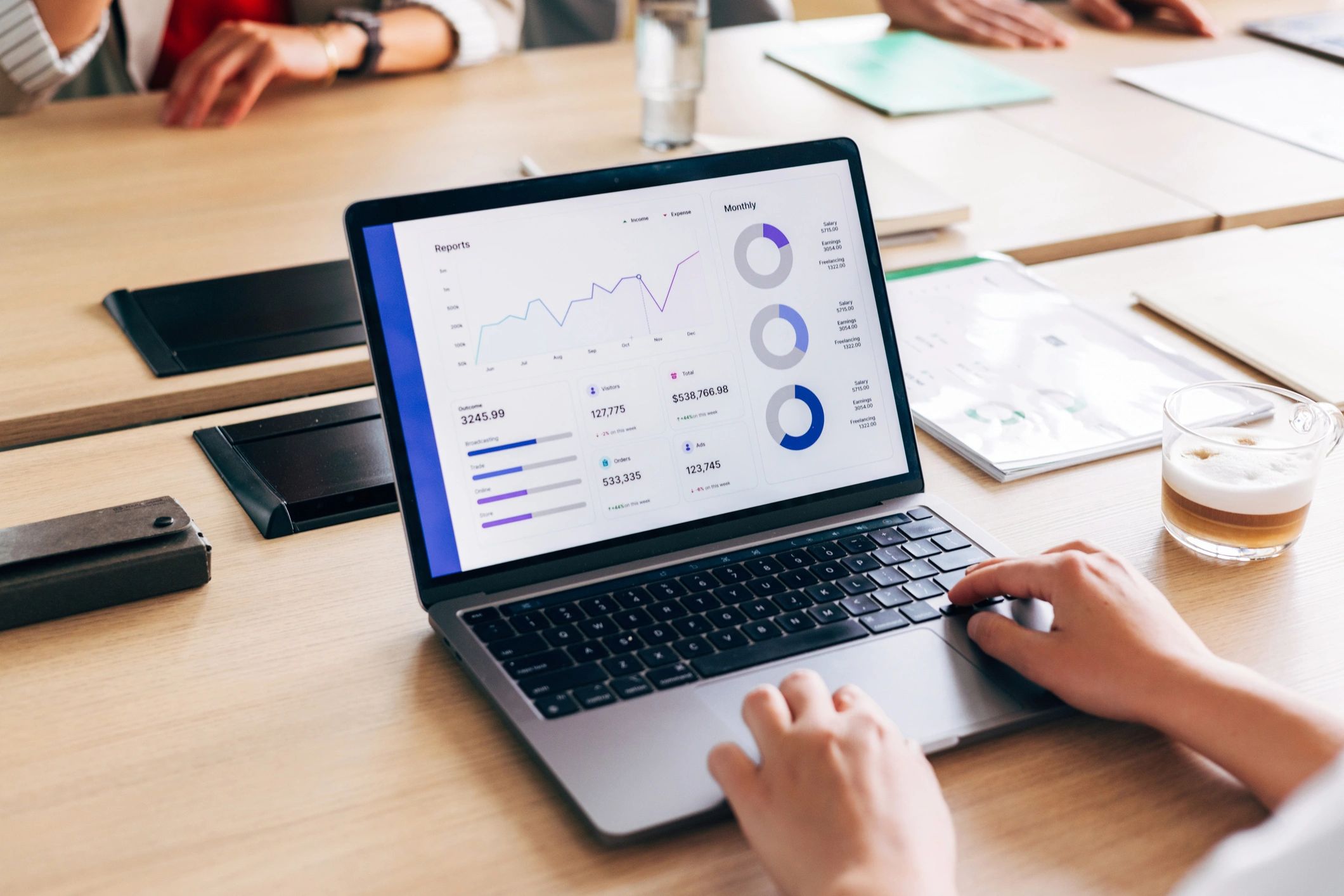 Team of data analysts collaborating in a modern office